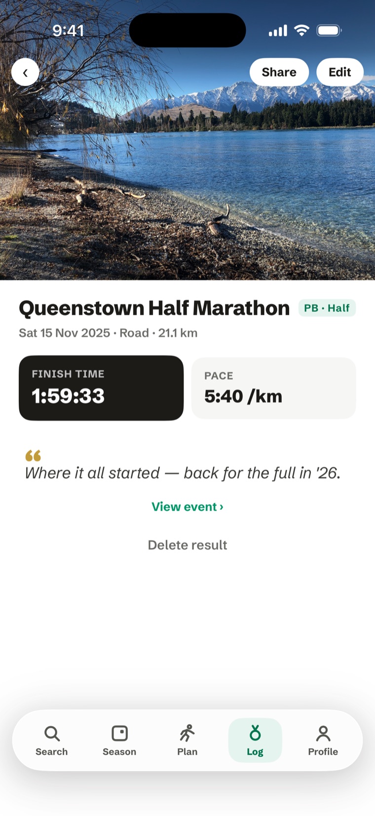 A race memory in RunCalendar — the runner's own lakeside photo above the Queenstown Half Marathon's finish time of 1:59:33, pace and a note